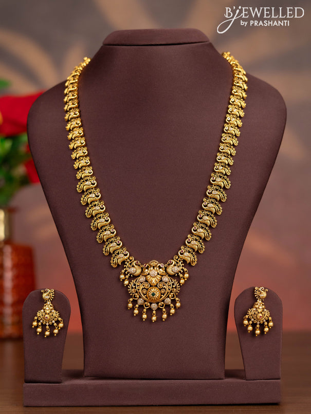 Antique haaram peacock design with kemp & cz stones and golden beads hangings