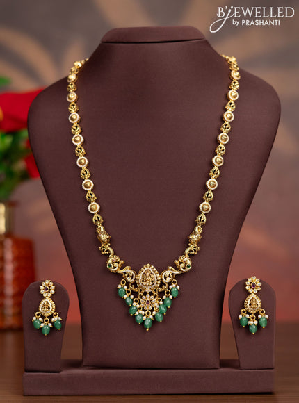 Antique haaram lakshmi design with kemp & cz stones and pearl & green beads hangings