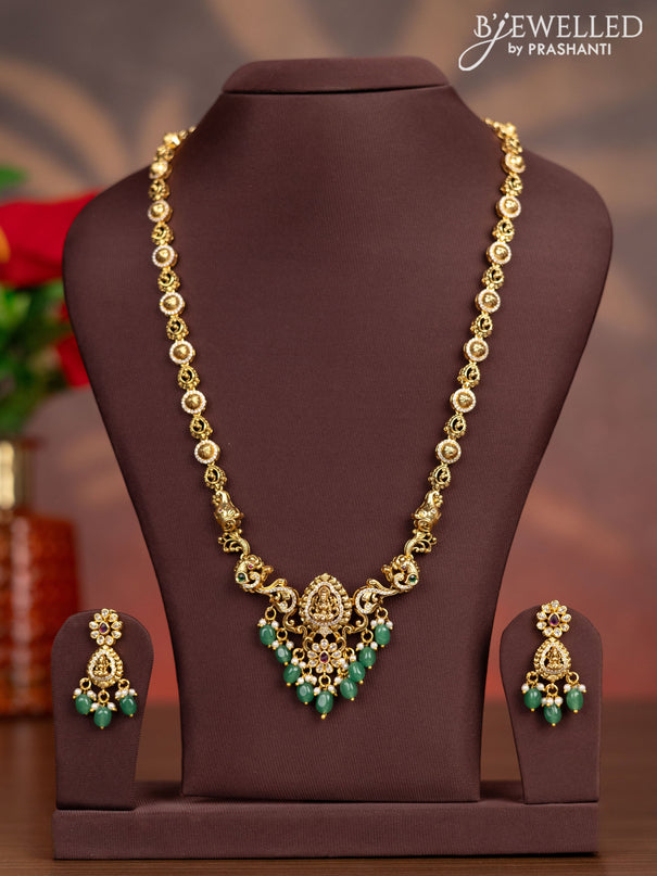 Antique haaram lakshmi design with kemp & cz stones and pearl & green beads hangings