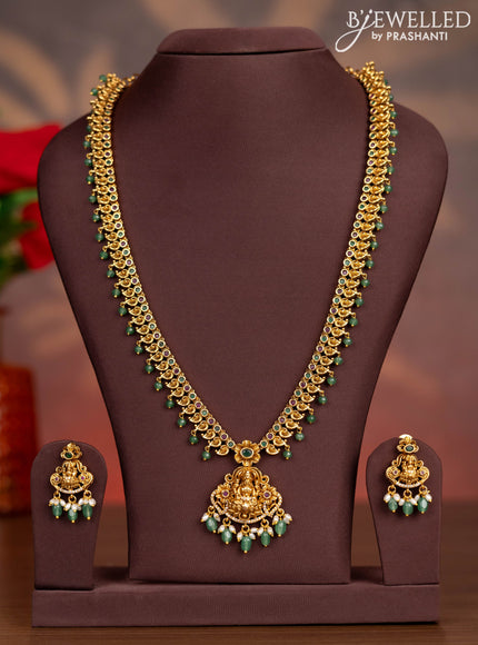 Antique haaram lakshmi pendant with kemp & cz stones and pearl & mint green beads hangings