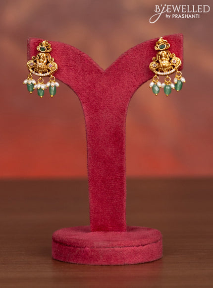 Antique haaram lakshmi pendant with kemp & cz stones and pearl & mint green beads hangings