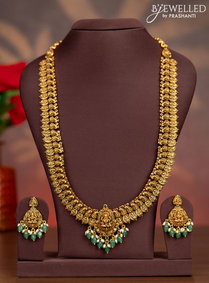 Antique haaram lakshmi kasu design with kemp stones and pearl & green beads hangings
