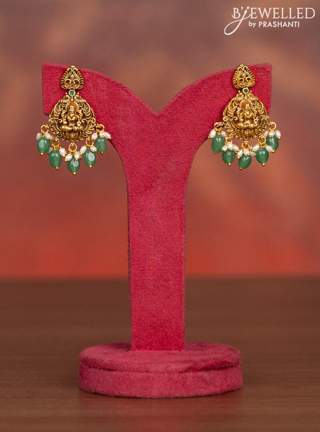 Antique haaram lakshmi kasu design with kemp stones and pearl & green beads hangings