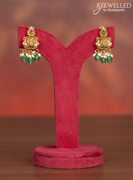 Antique haaram lakshmi pendant with kemp & cz stones and pearl & mint green beads hangings
