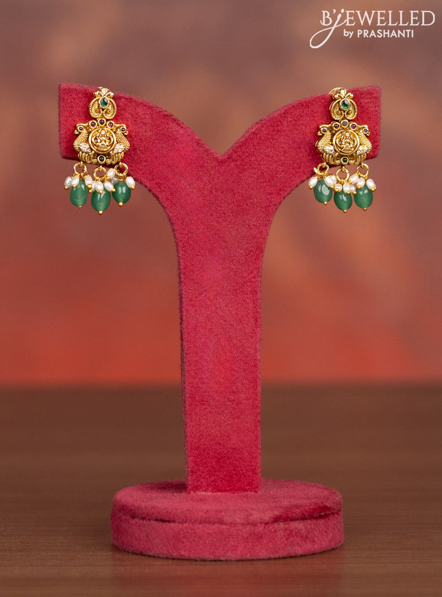 Antique haaram lakshmi pendant with kemp & cz stones and pearl & mint green beads hangings