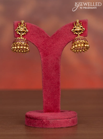 Antique haaram lakshmi pendant with pink kemp stones and golden beads hangings