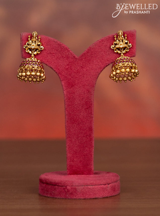 Antique haaram lakshmi pendant with pink kemp stones and golden beads hangings