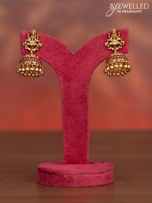 Antique haaram lakshmi pendant with pink kemp stones and golden beads hangings