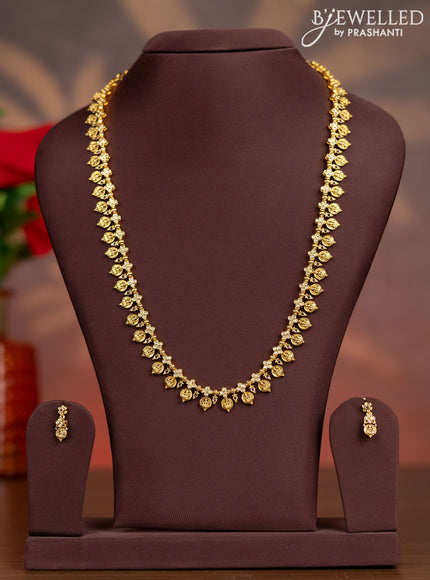 Antique haaram with lakshmi kasu design and pink kemp & cz stones
