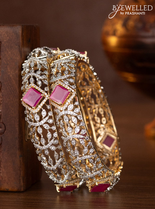 Zircon bangles with ruby and cz stones in gold finish