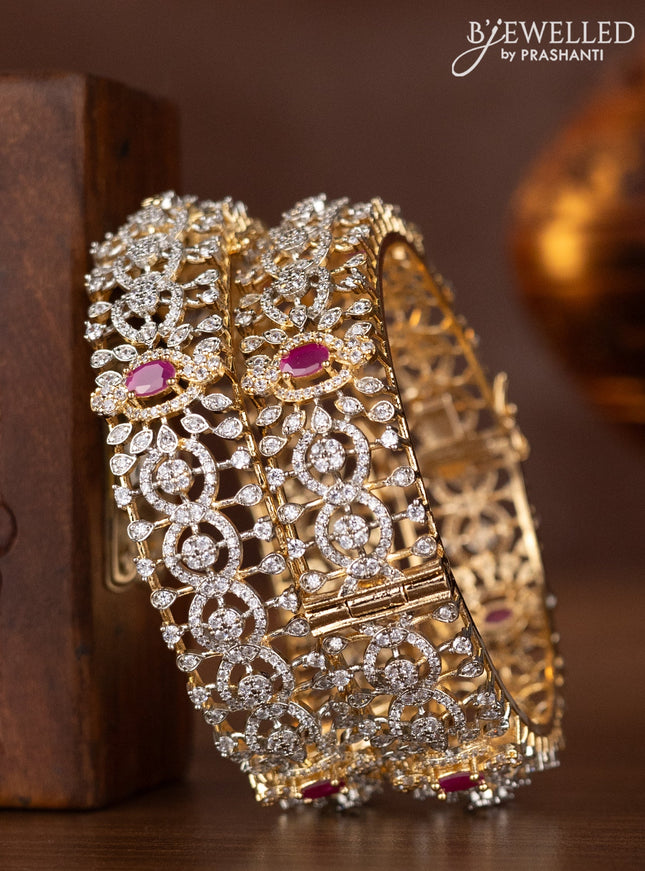 Zircon bangles with ruby and cz stones in gold finish