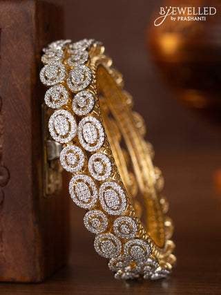 Zircon bangles with cz stones in gold finish