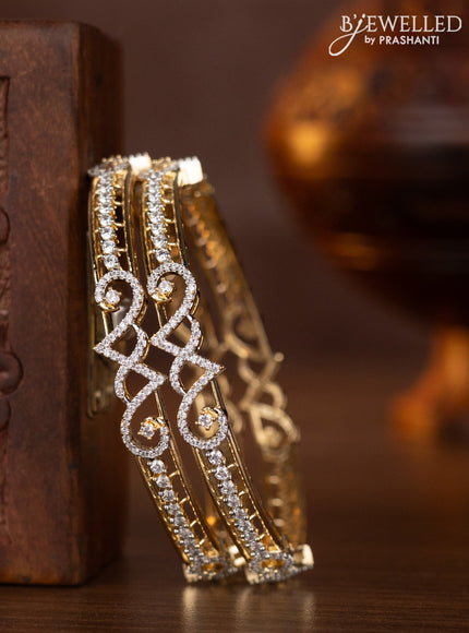 Zircon bangles with cz stones in gold finish