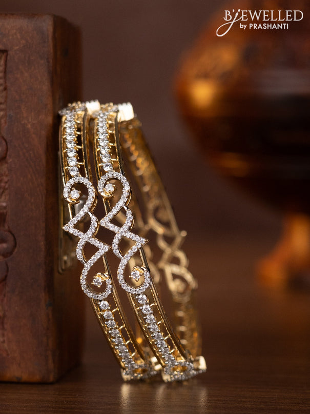 Zircon bangles with cz stones in gold finish