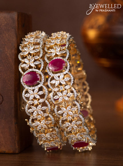 Zircon bangles with ruby and cz stones in gold finish