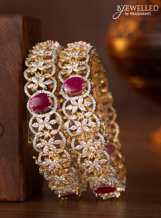 Zircon bangles with ruby and cz stones in gold finish