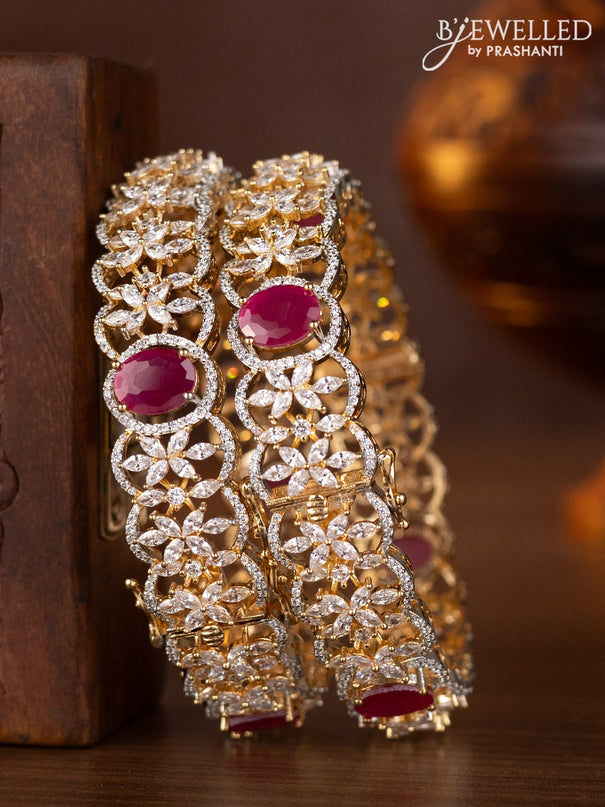 Zircon bangles with ruby and cz stones in gold finish