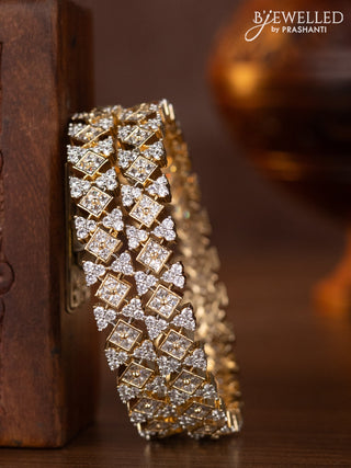 Zircon bangles with cz stones in gold finish