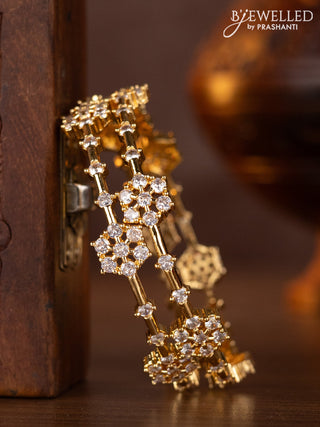 Zircon bangles with cz stones in gold finish
