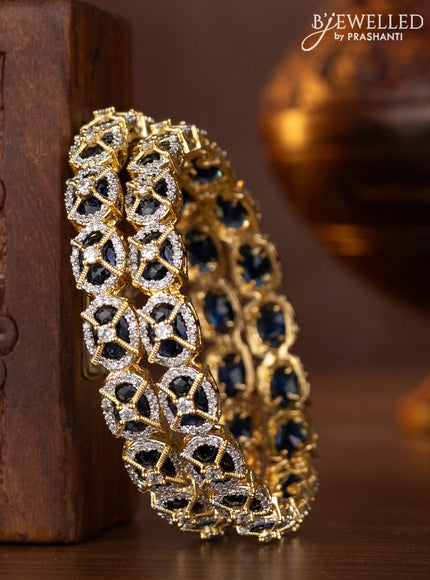 Zircon bangles with sapphire and cz stones in gold finish