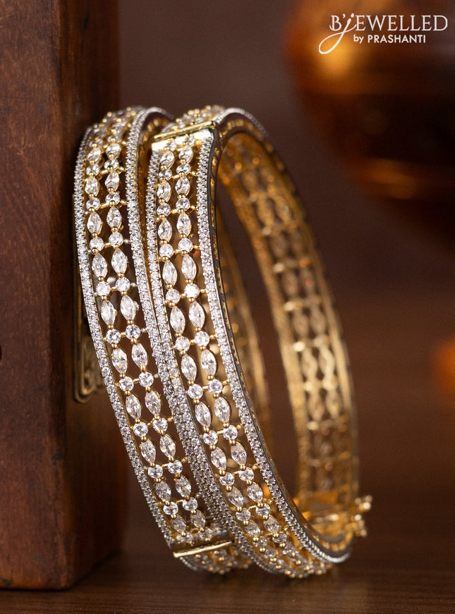 Zircon bangles with cz stones in gold finish