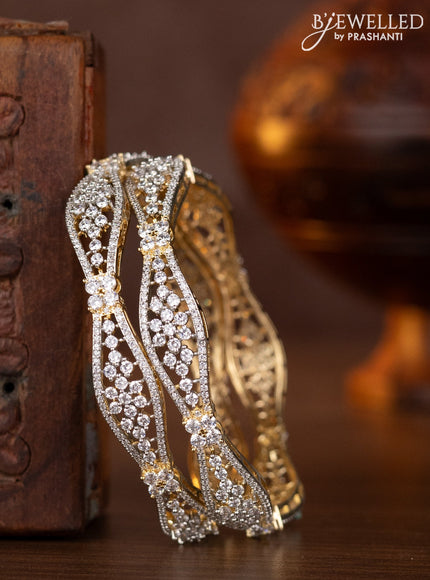 Zircon bangles with cz stones in gold finish
