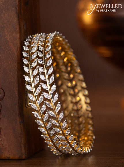 Zircon bangles with cz stones in gold finish