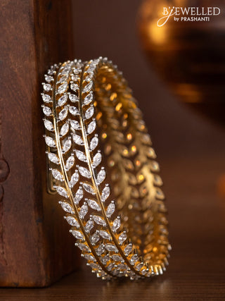 Zircon bangles with cz stones in gold finish