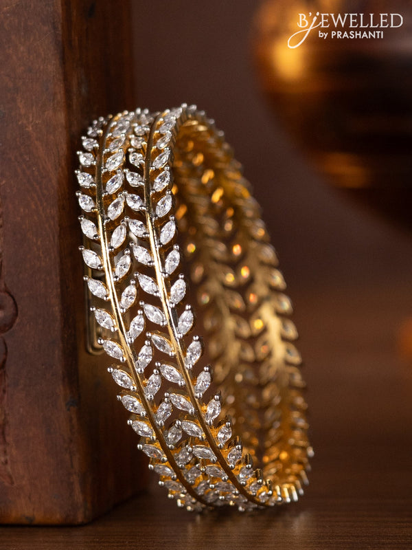 Zircon bangles with cz stones in gold finish