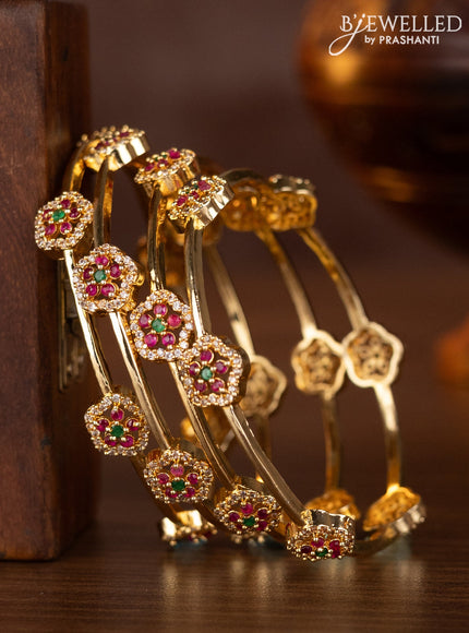 Zircon bangles with kemp and cz stones in gold finish