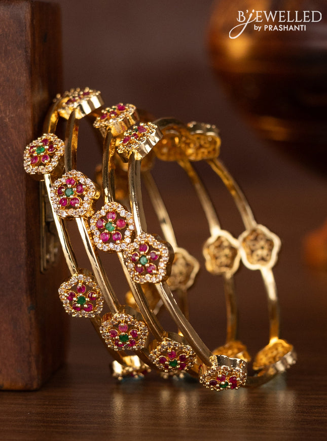 Zircon bangles with kemp and cz stones in gold finish