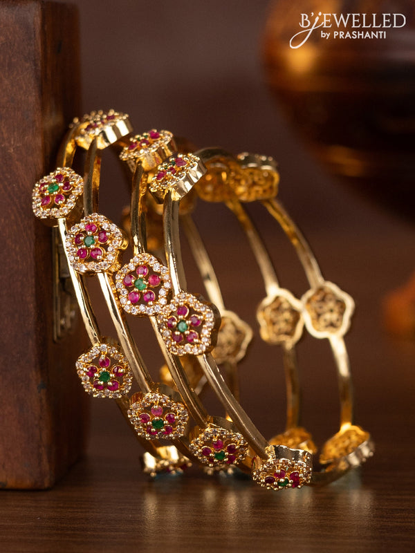 Zircon bangles with kemp and cz stones in gold finish