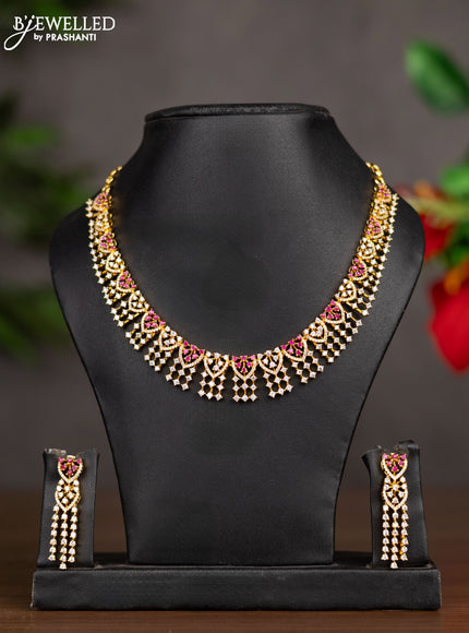 Zircon necklace with ruby and cz stones in gold finish