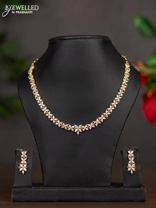 Zircon necklace with ruby and cz stones in gold finish