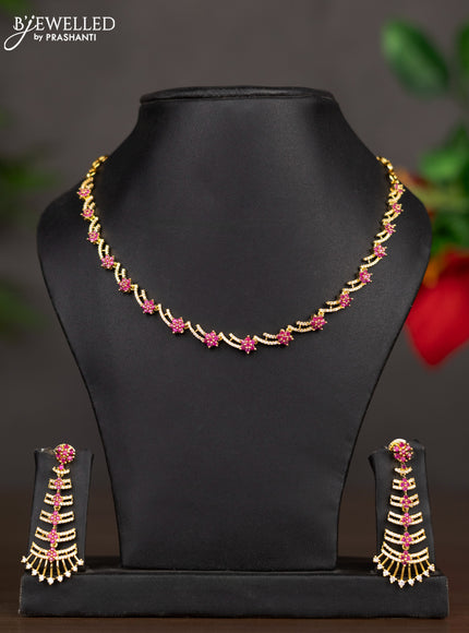 Zircon necklace with ruby and cz stones in gold finish