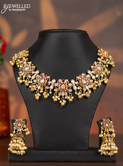Antique necklace lotus design with kemp & kundan stones and pearl & golden beads hangings