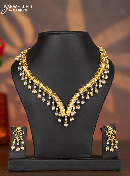 Antique necklace with simple design and pearl hangings