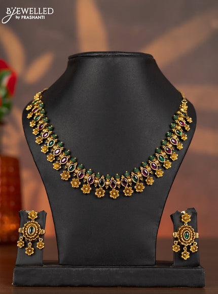 Antique necklace floral design with kemp stones