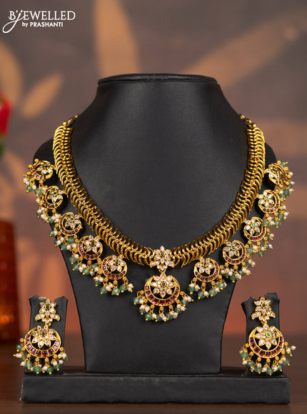 Antique necklace chandbali design with kemp & cz stones and pearl & mint green beads hangings