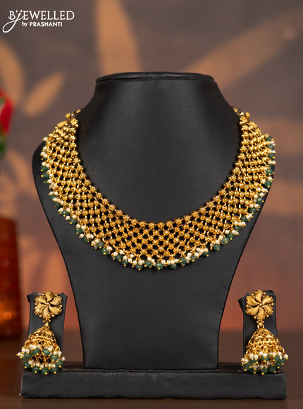Antique necklace with simple design and pearl & mint green beads hangings