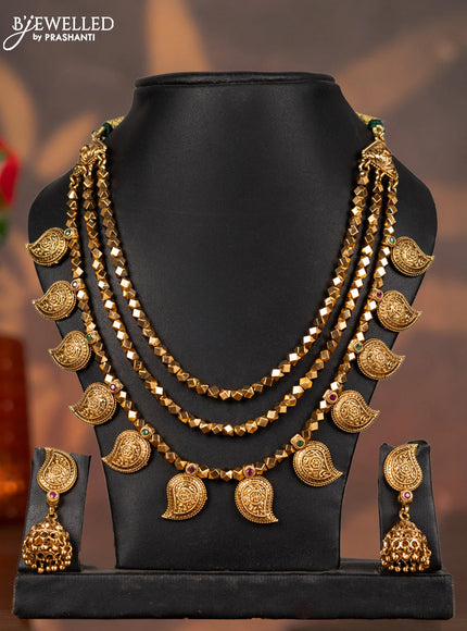 Antique triple layer necklace manga pattern with kemp stones