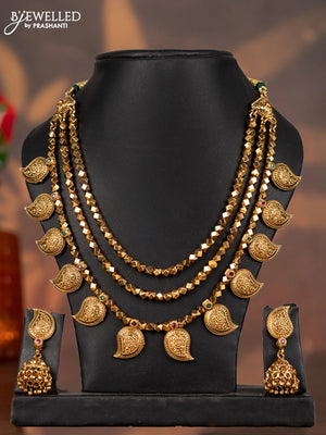 Antique triple layer necklace manga pattern with kemp stones