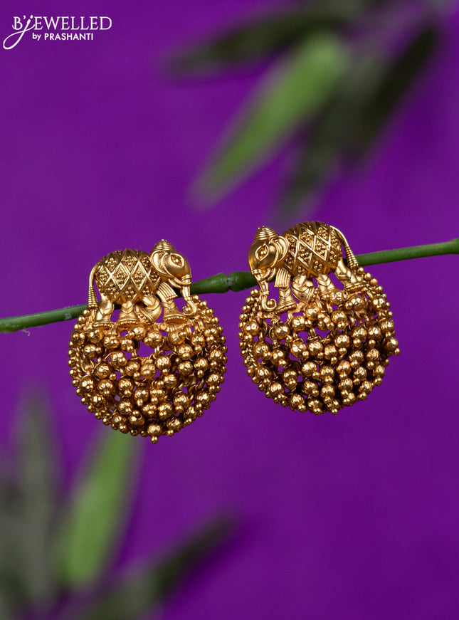 Antique earring with elephant design and golden beads hangings