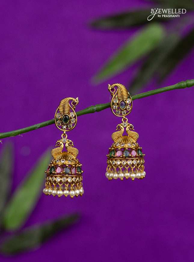 Antique jhumka peacock design with kemp & cz stones and pearl hangings