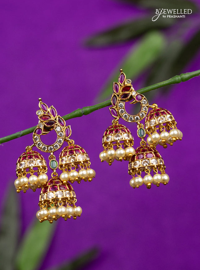 Antique jhumka peacock design with kemp & cz stones and pearl hangings