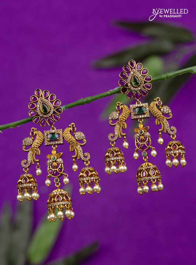 Antique jhumka peacock design with kemp & cz stones and pearl hangings