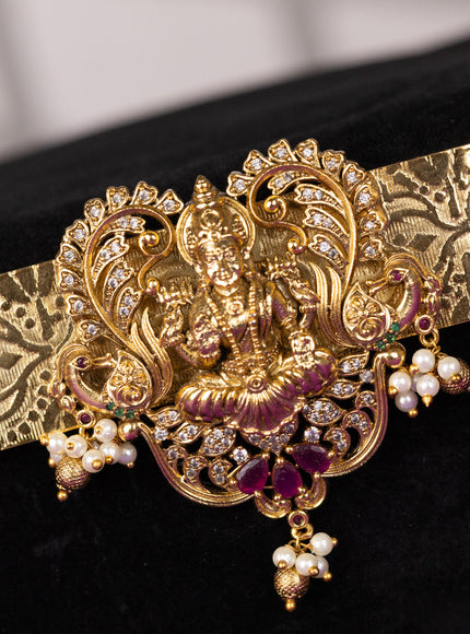 Antique self emboss hip belt with lakshmi design in kemp stones and pearl beads hanging