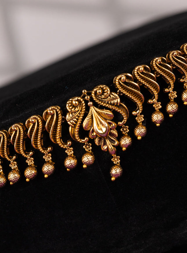 Antique hip chain in floral design with golden ball hanging