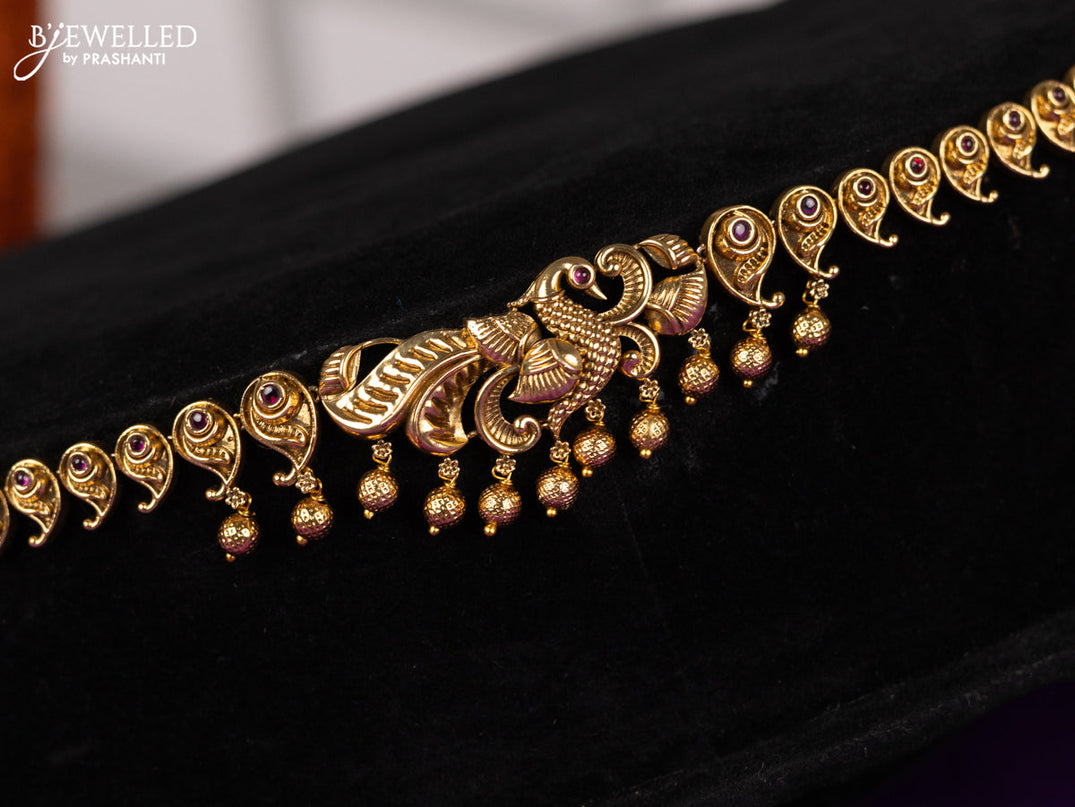 Antique hip chain in peacock design with kemp and golden beads hanging