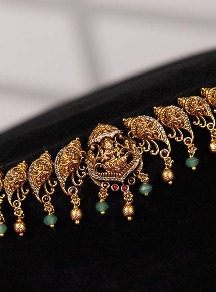 Antique hip chain in lakshmi & peacock design golden beads hanging